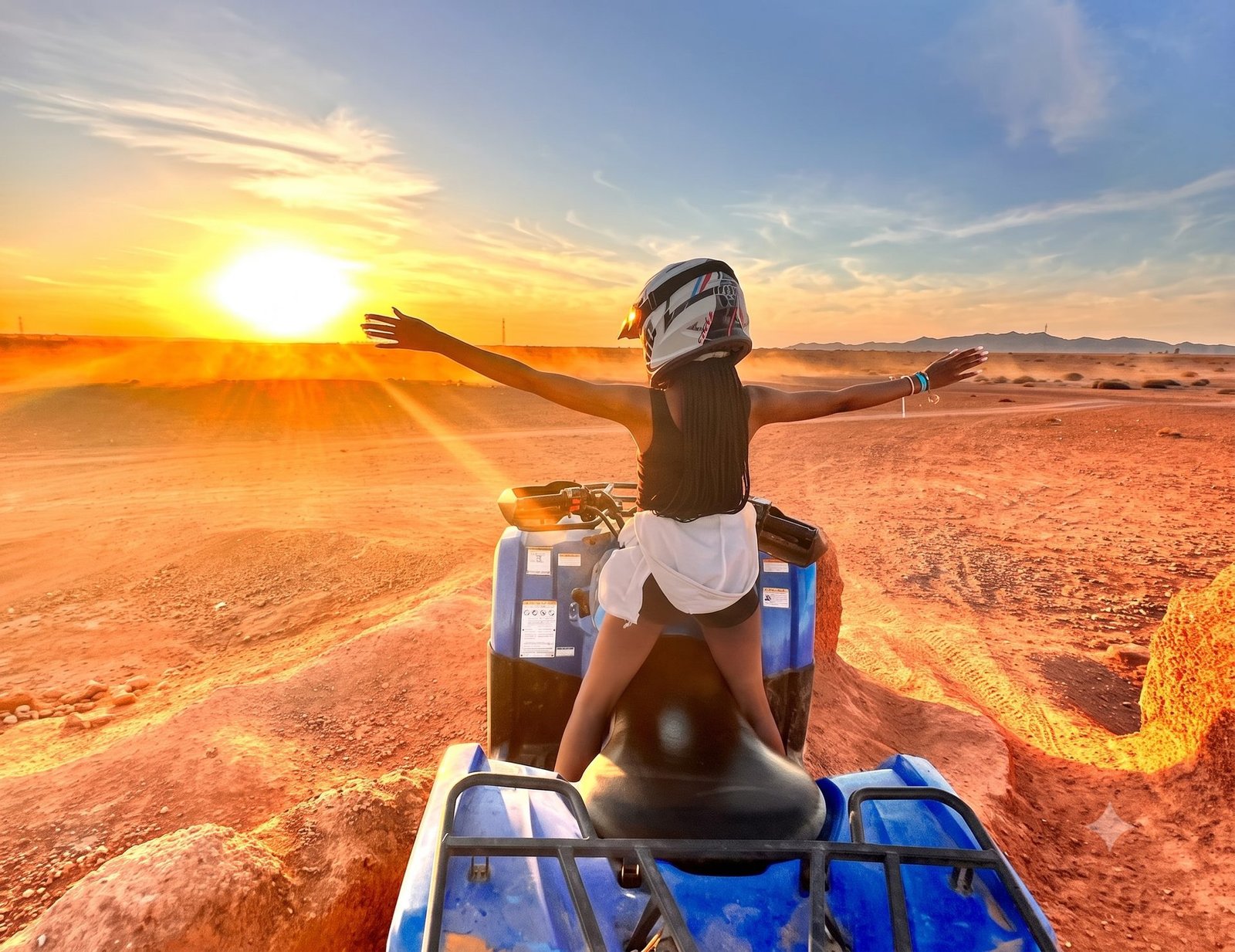 Quad biking across the Agafay desert at sunset near Marrakech